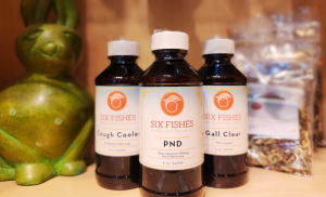 Six Fishes Formulas bottles